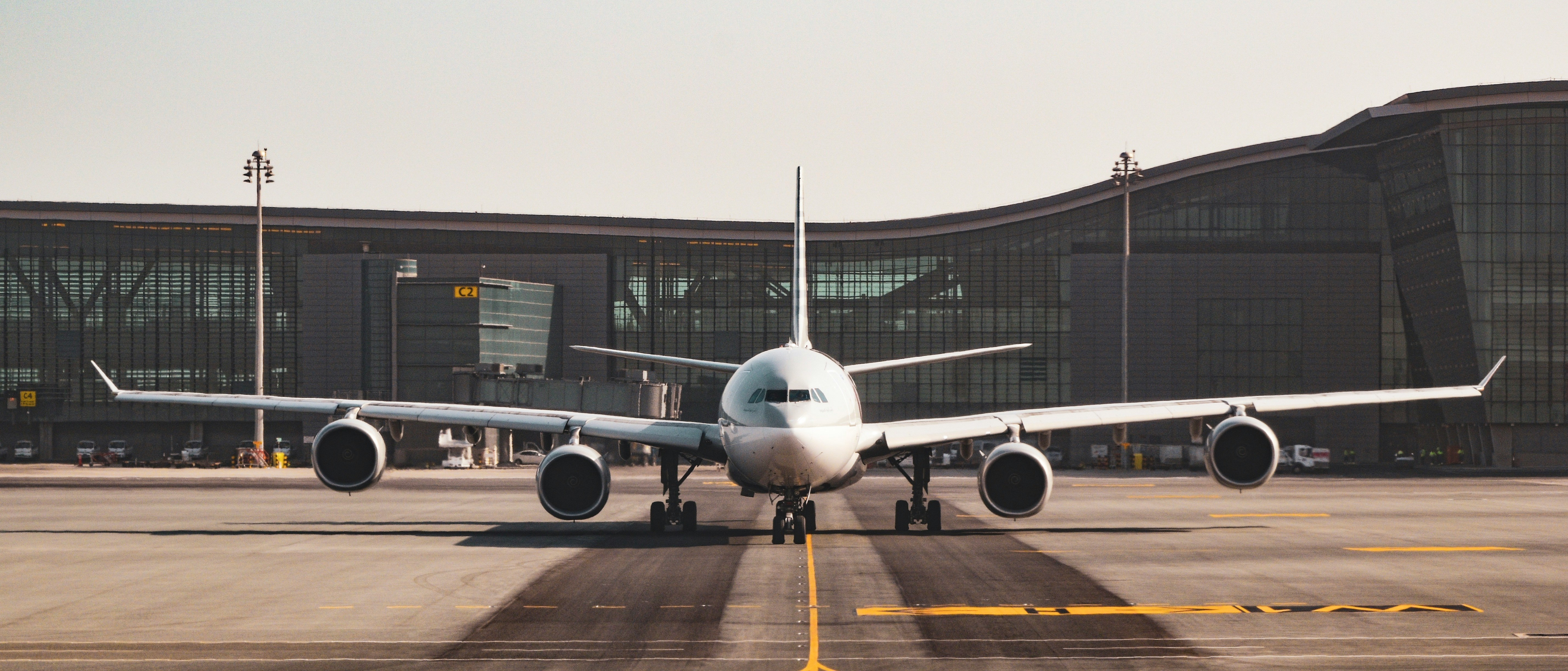 Airplane in field background
